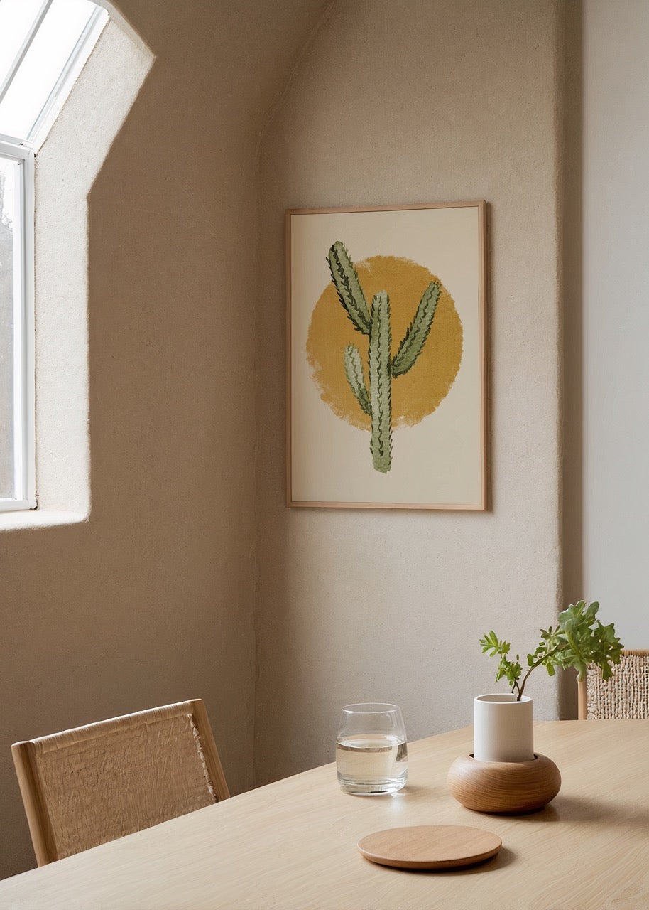 Turuncu daire zemin üzerinde yeşil kaktüs illüstrasyonu içeren minimal boho poster