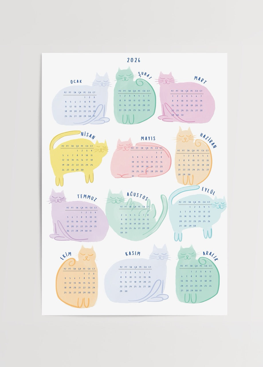 Yağmur Solakoğlu’nun pastel renkli sevimli kedilerden oluşan 2026 Catlender takvim posteri.