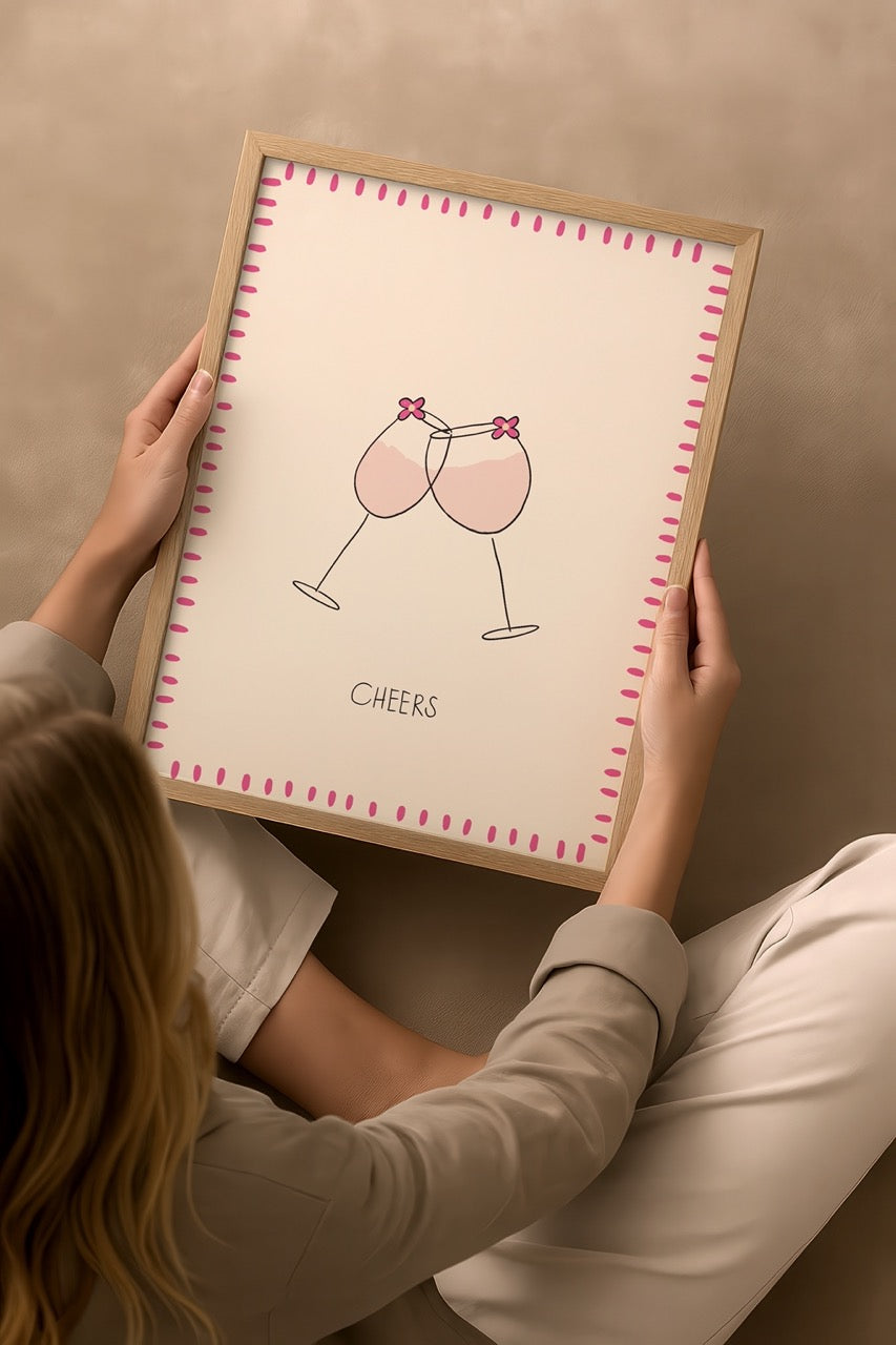 Nergis Sabancı’nın Cheers posteri; pembe çerçeve içinde iki kadehli minimal kutlama illüstrasyonu.