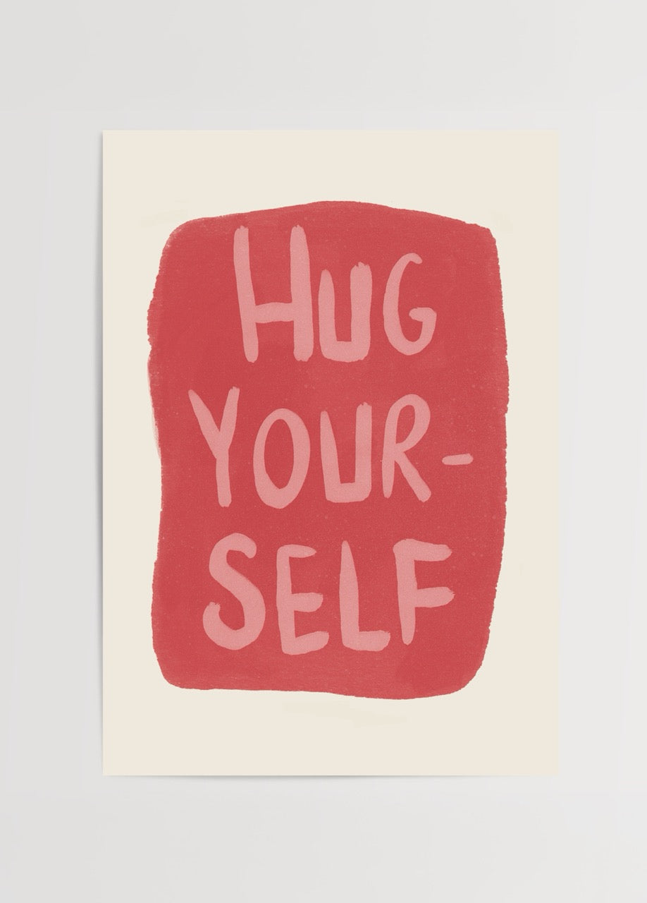 Krem zemin üzerinde, kırmızı bir formun içinde el yazısı karakterde “Hug Yourself” yazan sade ve duygusal illüstrasyon.
