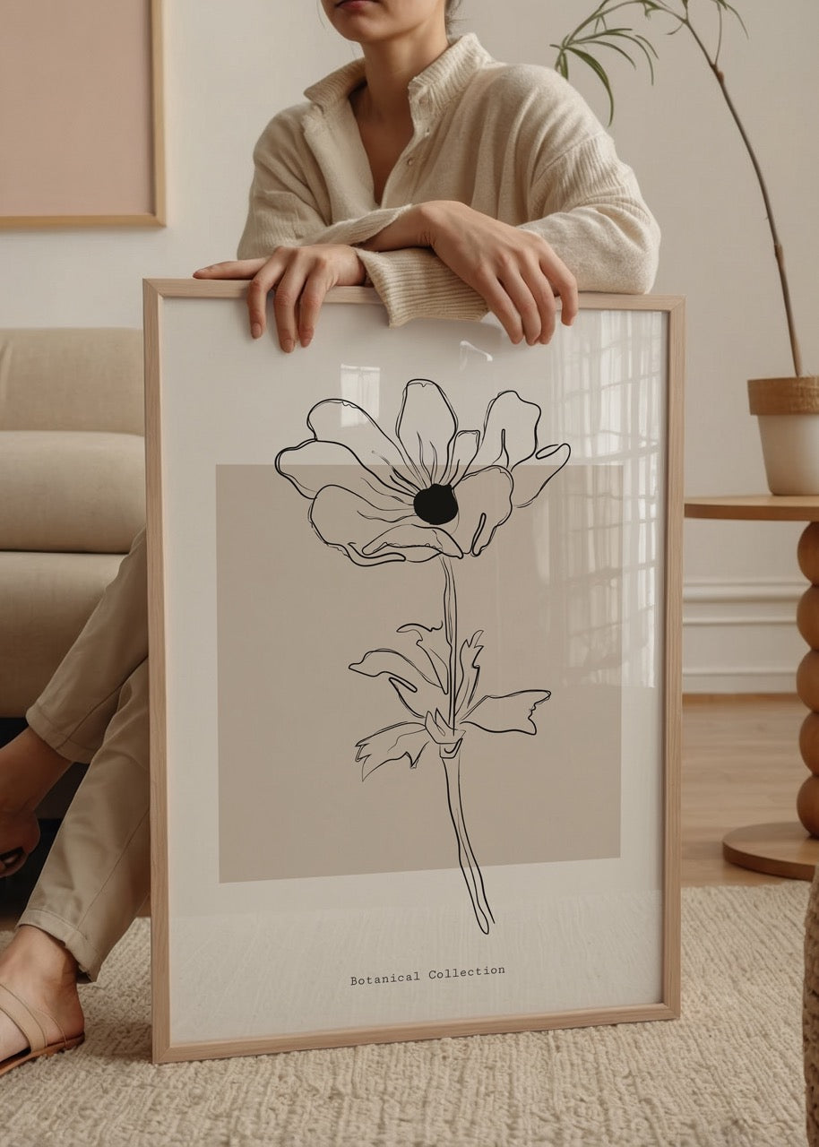 Bej zemin üzerine siyah çizgilerle tasarlanmış soyut çiçek illüstrasyonu ve altında &quot;Botanical Collection&quot; yazılı minimal duvar posteri.