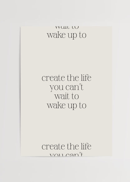 Beyaz zemin üzerine “create the life you can’t wait to wake up to” yazılı minimalist motivasyon posteri