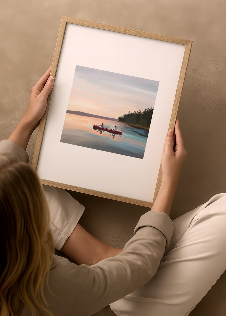 duygulariyerim’in “Kano Üzerinde Gün Batımı” eseri – gölde iki kişi, kırmızı kano ve pastel tonlarda huzurlu manzara
