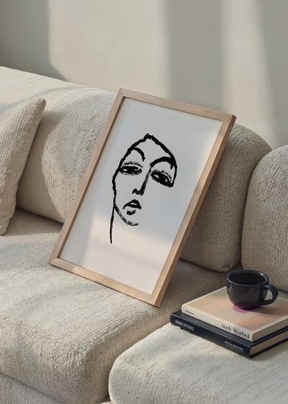 Siyah beyaz çizgisel stilize yüz illüstrasyonu içeren modern ve sade dekoratif poster

