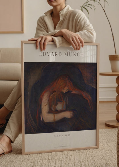 Edvard Munch’un 1895 tarihli “Vampyr” tablosunun poster versiyonu; uzun kızıl saçlı bir kadının başını eğmiş şekilde bir erkeğe sarıldığı duygusal ve karanlık sahne.