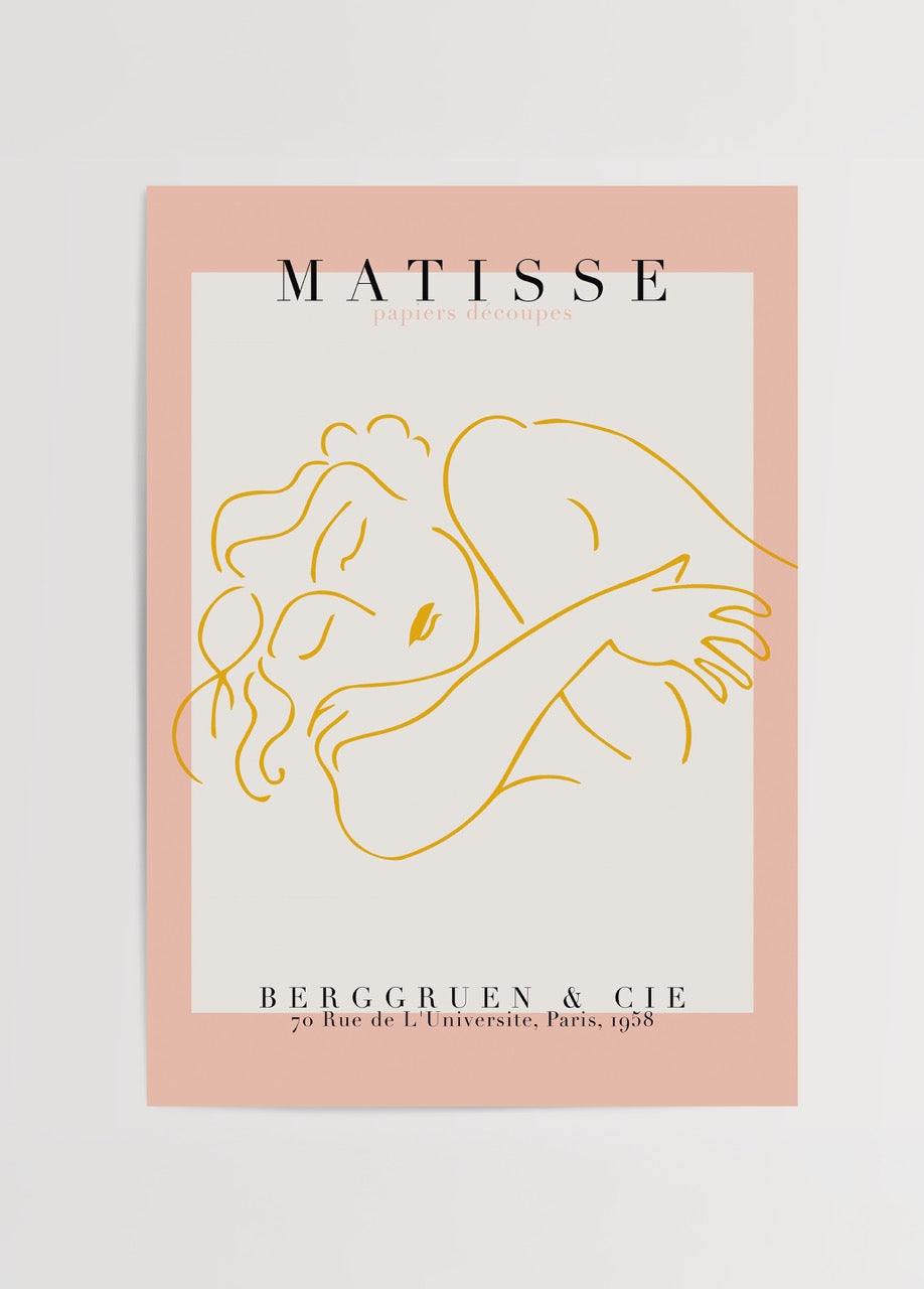 Henri Matisse’in çizgisel bir kadın figürünü betimleyen, pembe kenarlıklı ve “papiers découpés” yazılı modern sanat posteri.